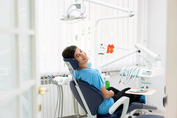 Visiting friendly and professional dentist. high photo Stock Photo