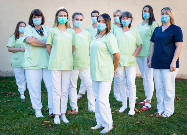 Nursing female team together portrait. high quality photo — Stockfoto