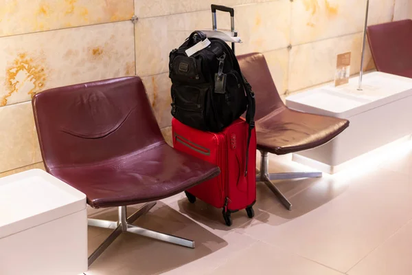 Bag in lounge at airport ready for near travel — Stock Photo, Image