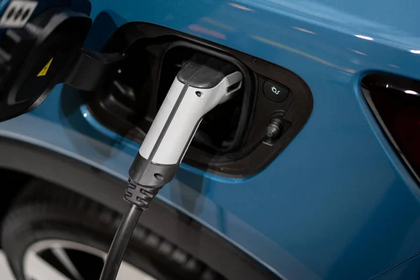 Power supply connect to electric vehicle for charge to the battery. . EV fuel Plug in hybrid car.