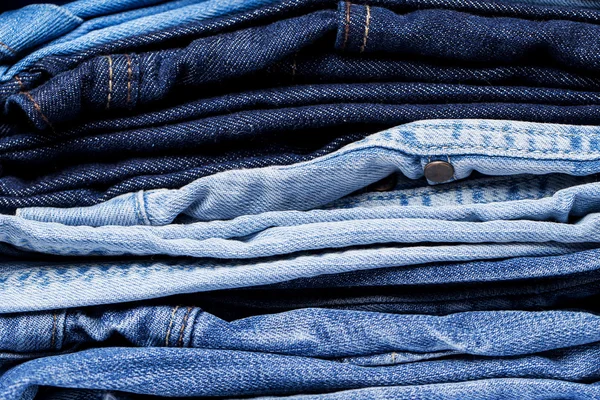 Closeup of pile of jeans