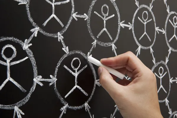 Hand sociala nätverk blackboard — Stockfoto