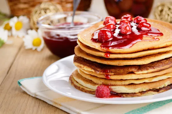 depositphotos_18940061-stock-photo-delicious-pancakes-with-raspberries-on.jpg