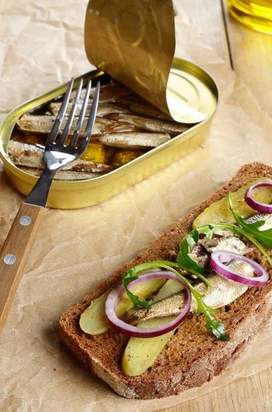 Sprat sandwich with pickled vegetables — Stock Image Sprat sandwich with pickled vegetables Stock Image