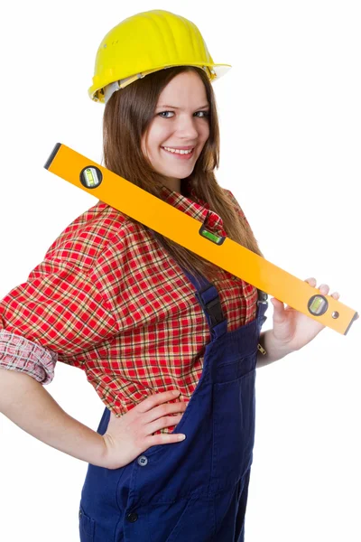 Craftswoman carrying water-level — Stock Photo, Image