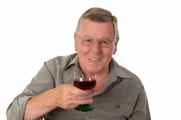 Old man drinking red wine — Stock Photo, Image