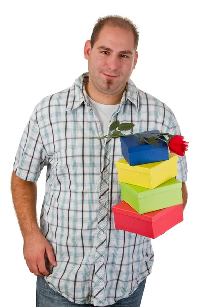 Homem segurando presentes — Fotografia de Stock