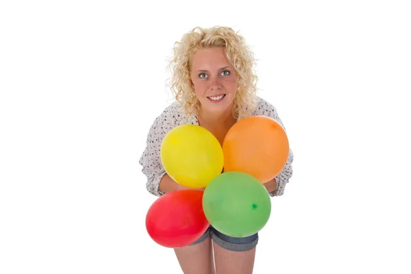 Ung kvinna med ballonger — Stockfoto