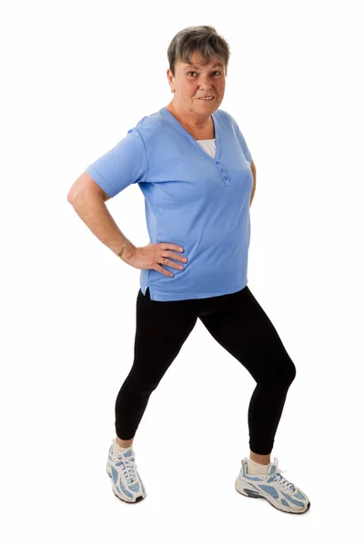 Senior woman doing stetching exercises — Stock Photo, Image