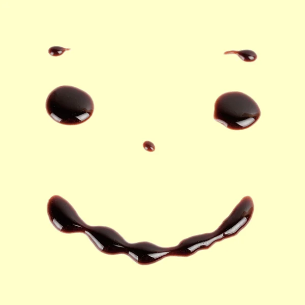 Усміхнене обличчя chokolate сиропу — стокове фото