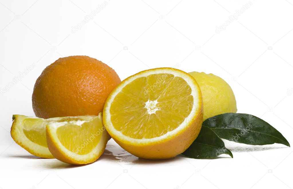 Whole orange fruit and his segments or slices