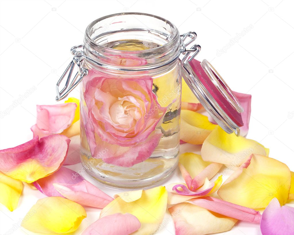Aromatic rose water and petals