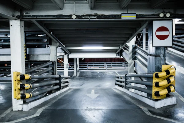 Parking garage in basement, underground interior, stop sign entr — Stock Image Parking garage in basement, underground interior, stop sign entr Stock Picture