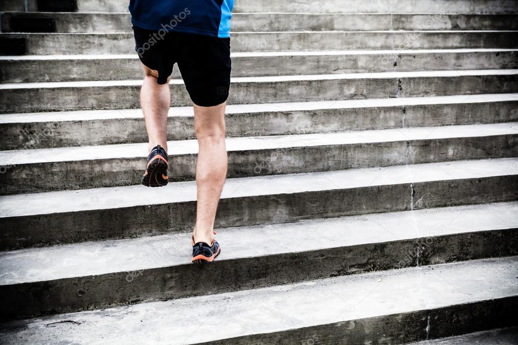 Man running on stairs, sports training