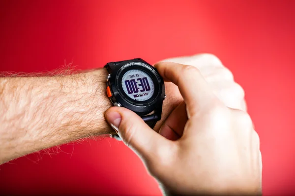 Runner checking sport watch XXXL Royalty Free Stock Photos