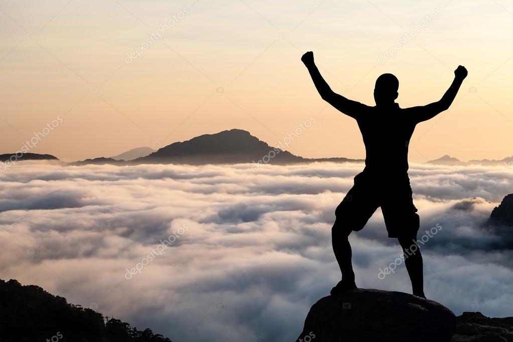 depositphotos_34605569 stock photo man hiking climbing silhouette in