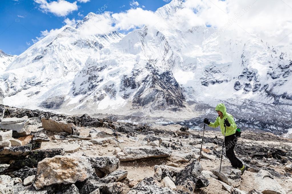 Woman hiking with Everest in background