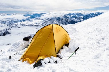 Camping in Caucasus Mountains on Elbrus landscape clipart