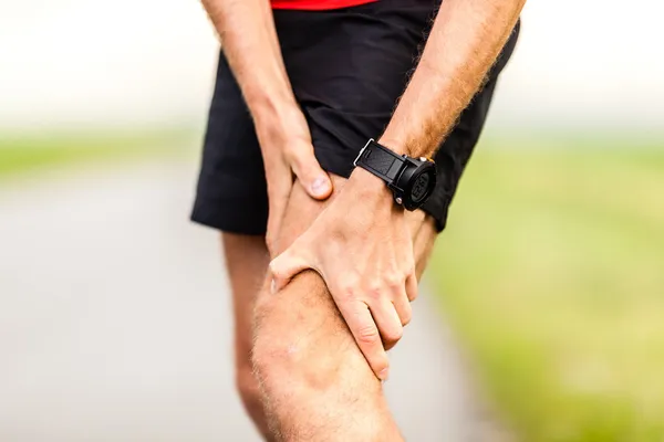 Corredores pierna dolor de rodilla lesión — Foto de Stock