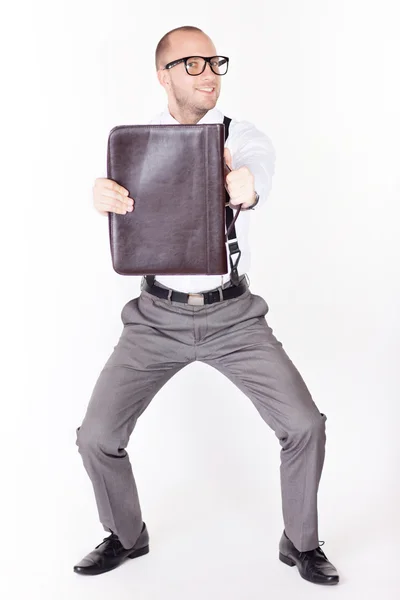 Genç işadamı bir evrak çantası elinde — Stok fotoğraf
