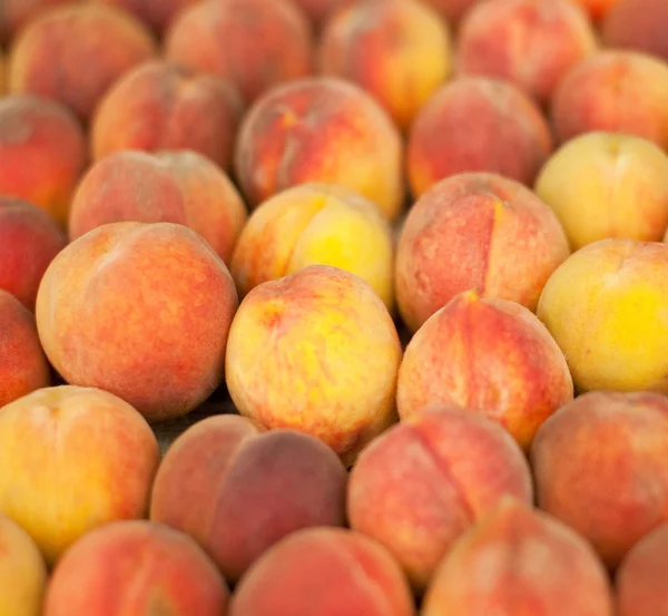 Padrão de pêssegos textura fruta mercado pêssego fundo — Fotografia de Stock