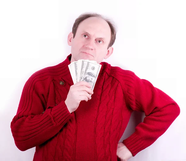 A man holding dollars in his hand — Stock Photo, Image