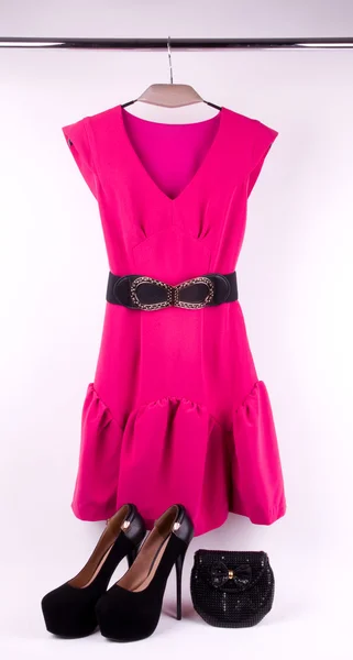 Pink dress on a hanger — Stock Photo, Image