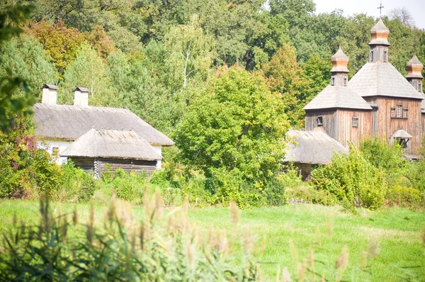 Old wooden church in the village — Stock Photo, Image