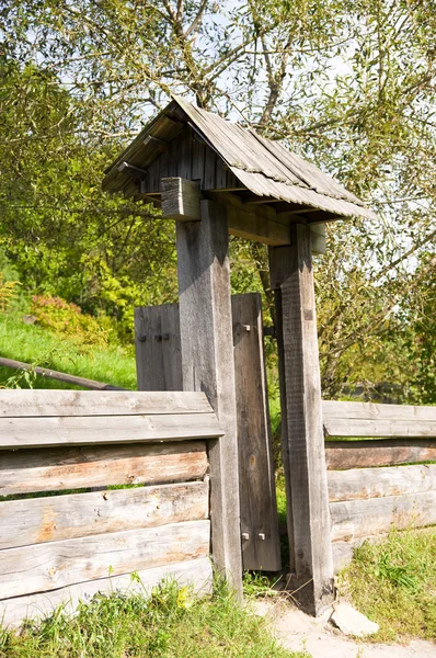 Opened wooden gate — Stock Photo, Image