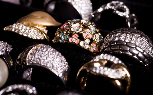 Beautiful jewelry on black background — Stock Photo, Image