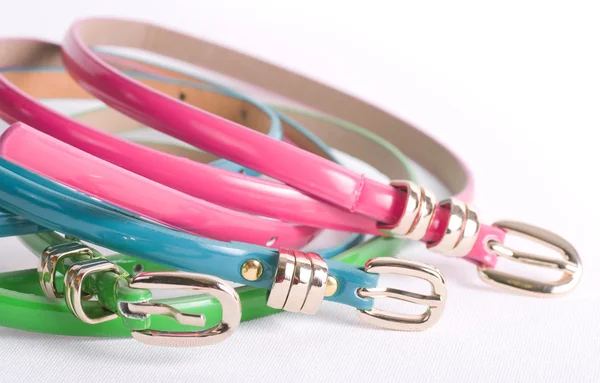 Fashionable colorful belts on white background — Stock Photo, Image