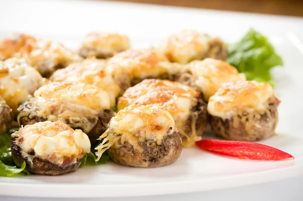 Stuffed mushrooms with cheese — Stock Image Stuffed mushrooms with cheese Royalty Free Stock Photos