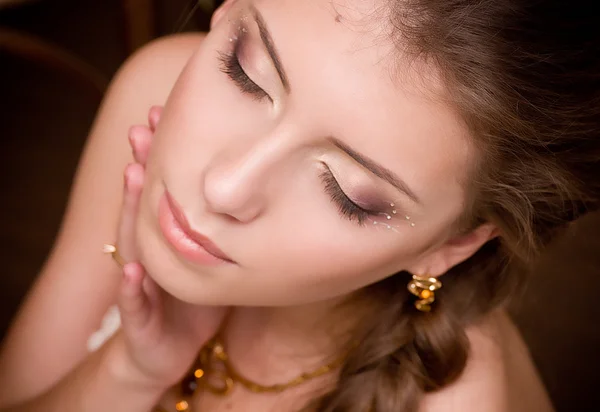 Portrait of beautiful young woman with makeup — Stock Photo, Image