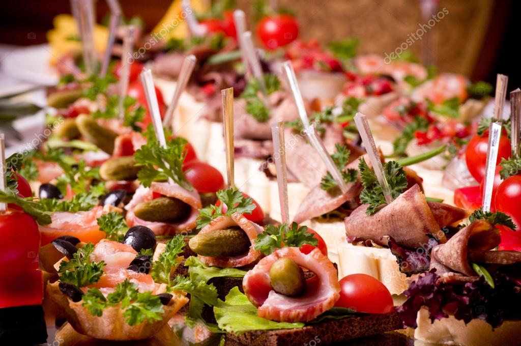 A lot of cold snacks on buffet table, catering — Stock Photo © Forewer