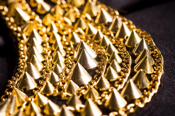 Gold plated bracelet with spikes — Stock Photo, Image