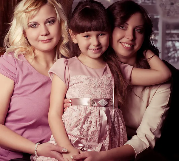 Happy family, young beautiful mother, aunt and her little daughter — Stock Photo, Image