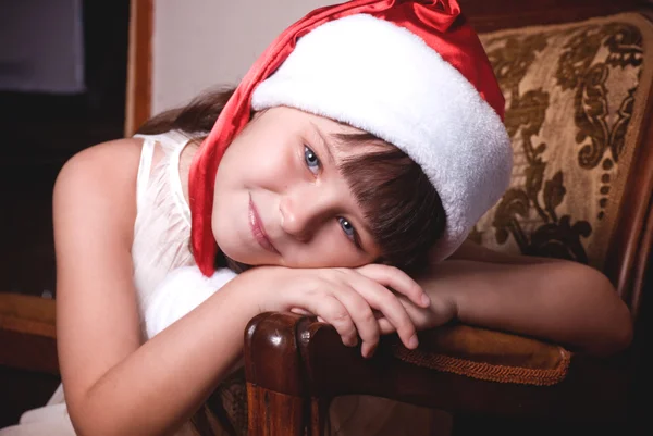 Little girl in santa hat — Stock Photo, Image