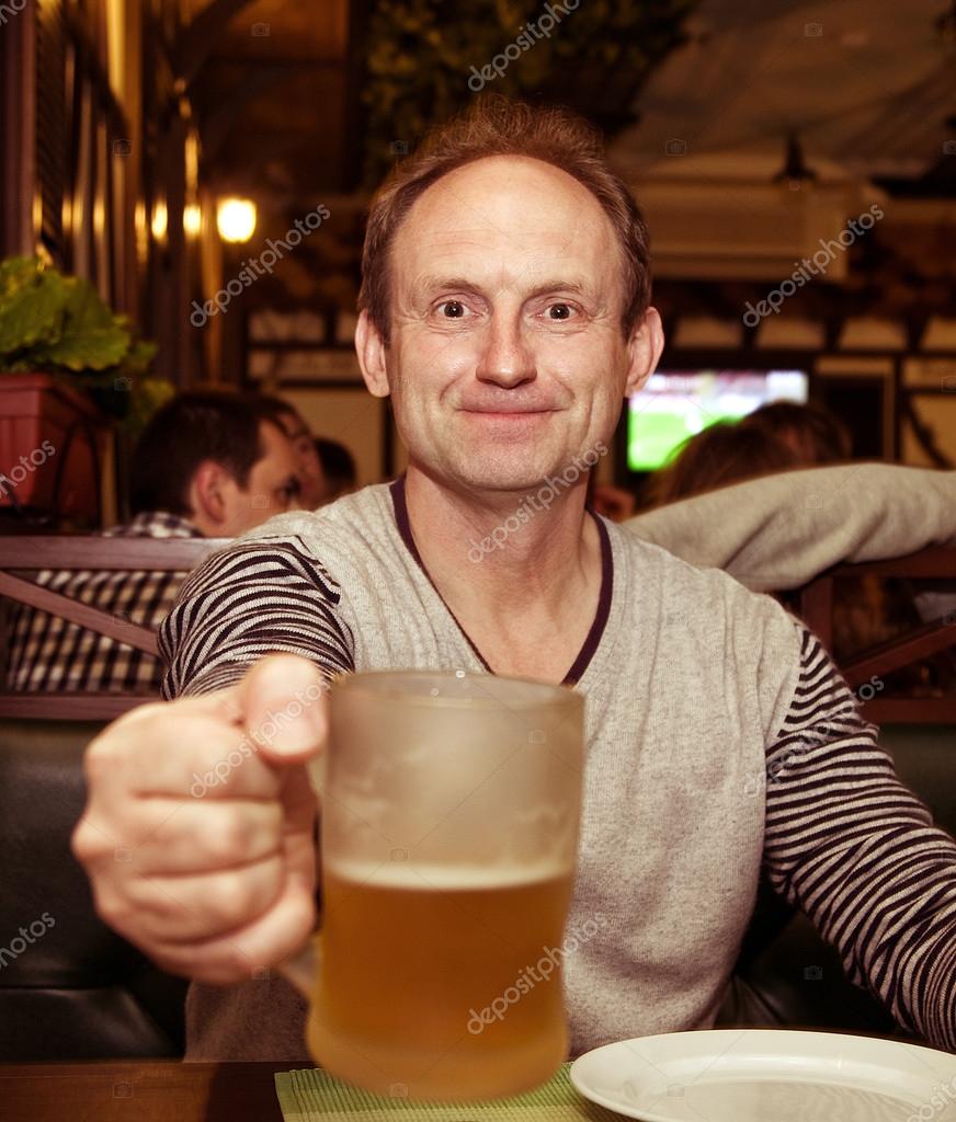 Man holding a beer belly — Stock Photo © Forewer 23268756