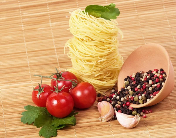 Tasty food ingredients and Italian pasta — Stock Photo, Image