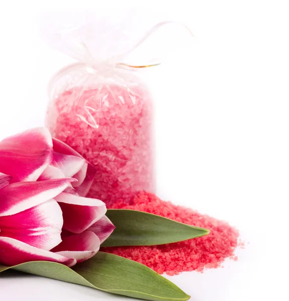 Spa salt and tulips on white background — Stock Photo, Image