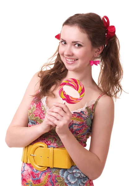 Bella ragazza con lecca-lecca a spirale rosa — Foto Stock