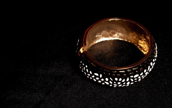 Black ring isolated on black background — Stock Photo, Image