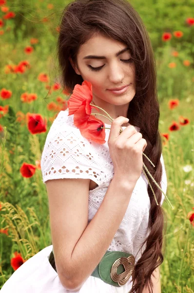 Beautiful woman in spring garden — Stock Photo, Image