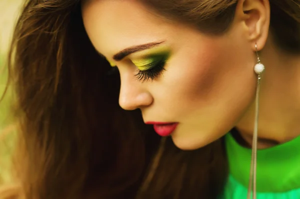 Portrait of beautiful young woman with makeup — Stock Photo, Image