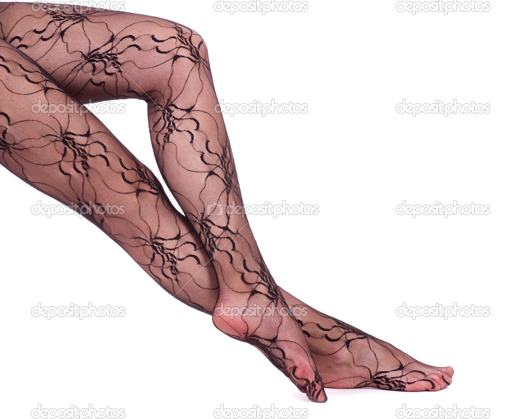 Sexy womanish legs isolated on the white