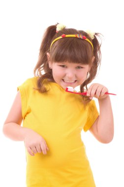 Kız dişlerini diş ipi