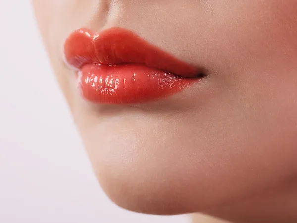 Close-up van mooie vrouwelijke lippen — Stockfoto