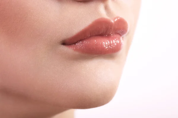 Close-up van mooie vrouwelijke lippen — Stockfoto