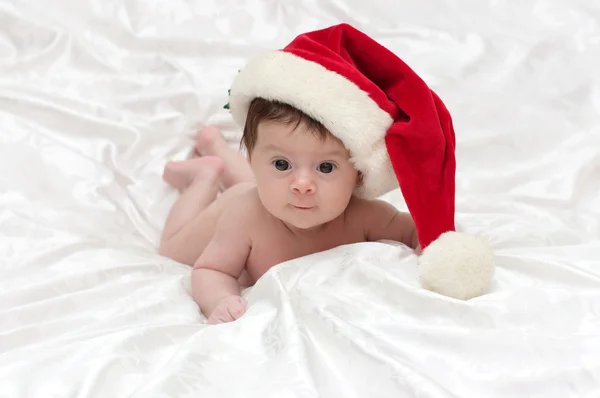 Christmas little cute girl with Santa hat — Stock Photo, Image