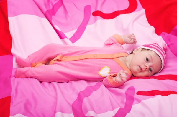 Beautiful baby girl on pink background — Stock Photo, Image